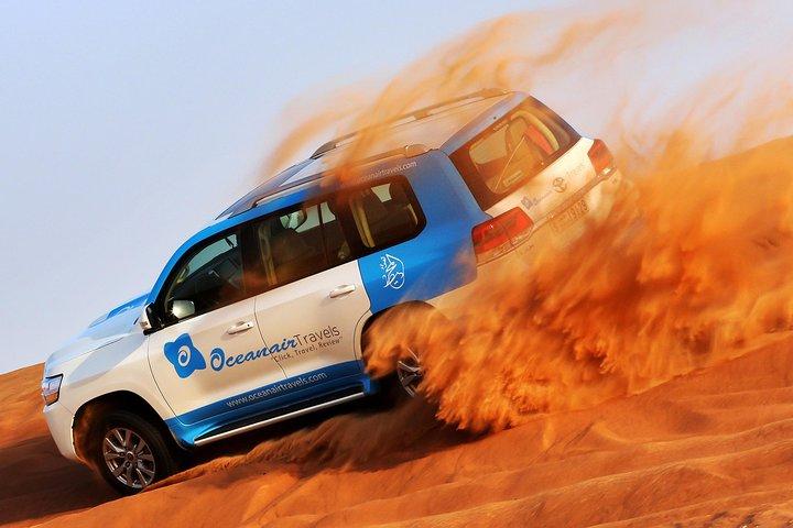 Abu Dhabi : Safari dans le désert avec barbecue, balade à dos de chameau et planche à sable