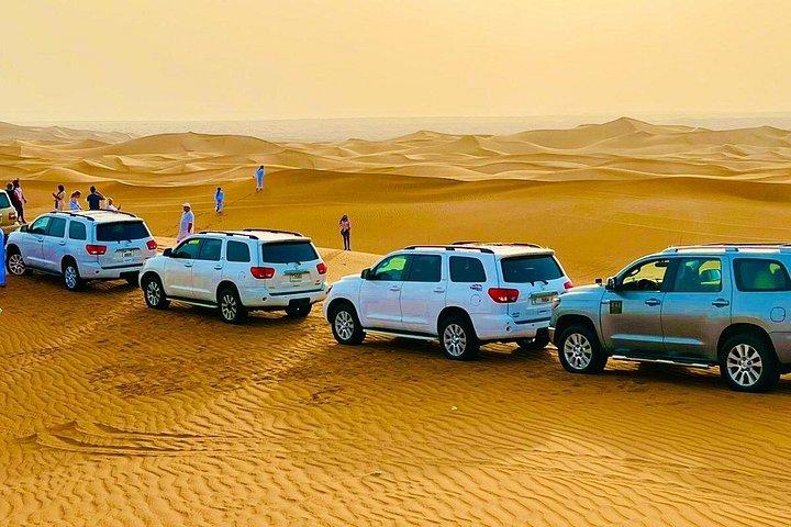 Safari dans le désert l'après-midi avec quad, balade à dos de chameau et sandboard