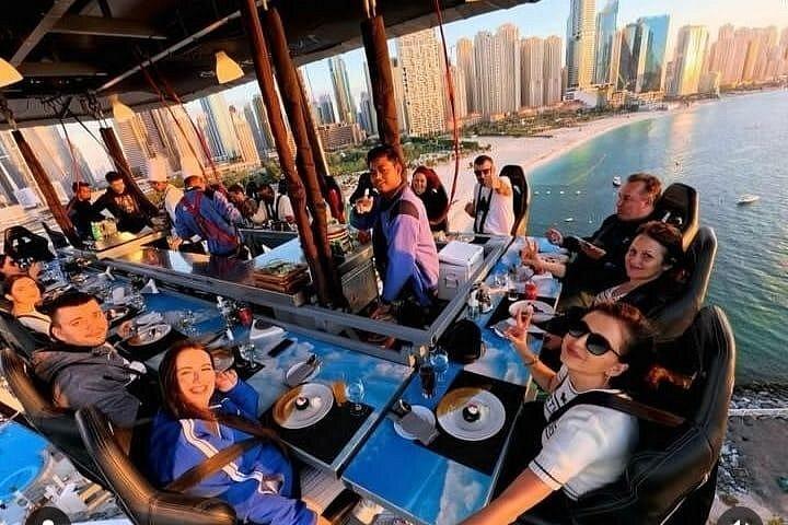 Dubaï: Expérience culinaire dans le ciel avec transport privé