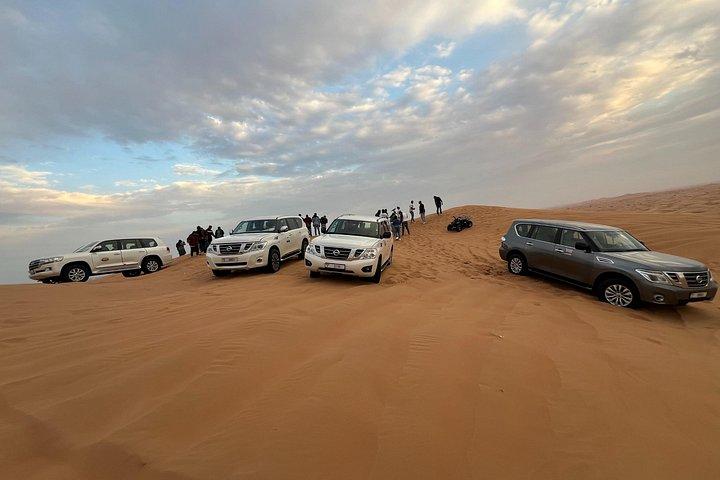 Red Dune Desert Safari Camel Ride, sandboard avec dîner barbecue