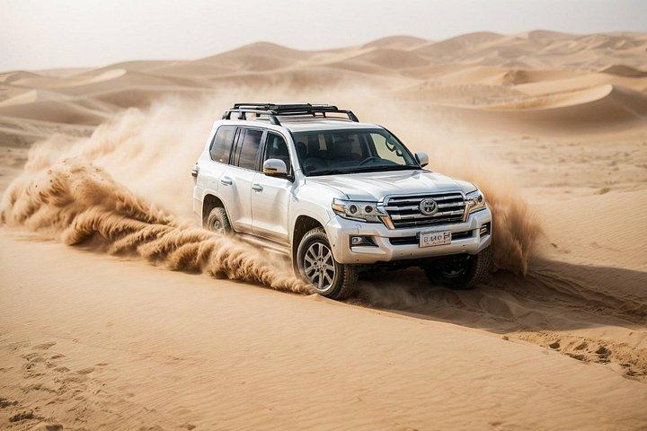 Safari dans le désert de Dubaï avec quad, sandboard et dîner barbecue