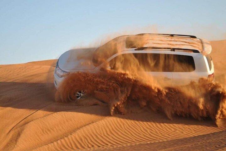 Safari dans le désert 4X4 Dubaï Red Dunes, balade à dos de chameau, danse, dîner barbecue