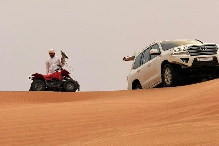 Safari dans le désert rouge de Dubaï avec quad, danse du ventre et dîner barbecue