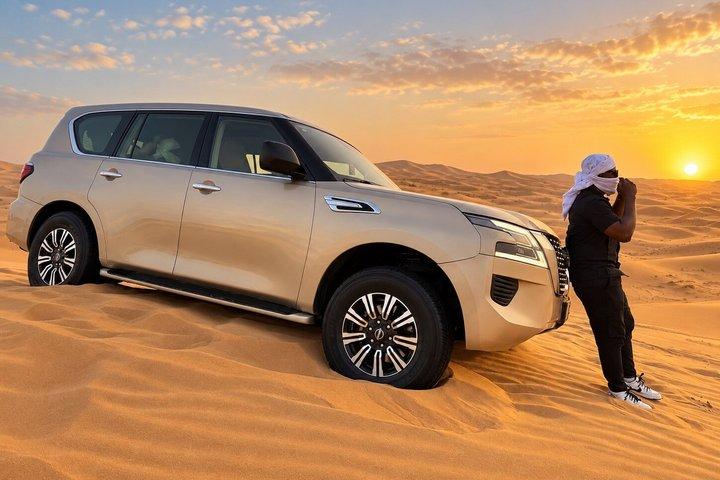Safari dans les dunes rouges de Dubaï, balade en chameau, dîner barbecue et spectacles