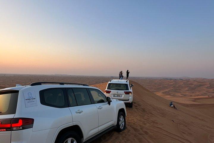 Safari dans le désert de Dubaï avec Dune Bashing et Camel Ride Plus BBQ