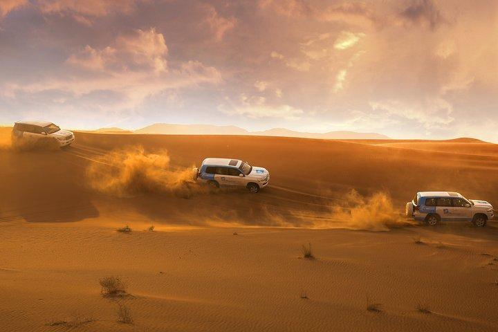 Safari dans le désert des dunes rouges de Dubaï, quad, chameaux à Al Khayma