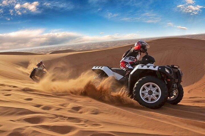 Morning Red Dunes en quad, balade à dos de chameau et sandboard