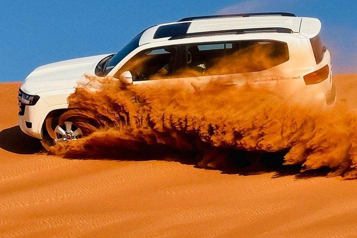 Safari en quad dans le désert de Dubaï, barbecue et balade à dos de chameau