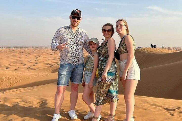 Safari désert rouge matinal à Dubaï, dune bashing, chameau et sandboarding